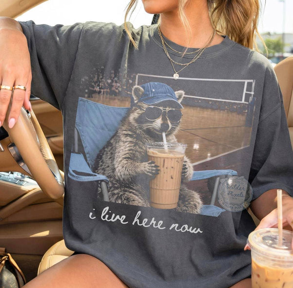 “I Live Here Now” Volleyball Raccoon Graphic Tee